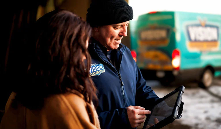 technician with happy customer - vision gd